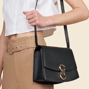 Cafune- Black Leather Long Shoulder Strap Gold Hardware Pendulum Bag